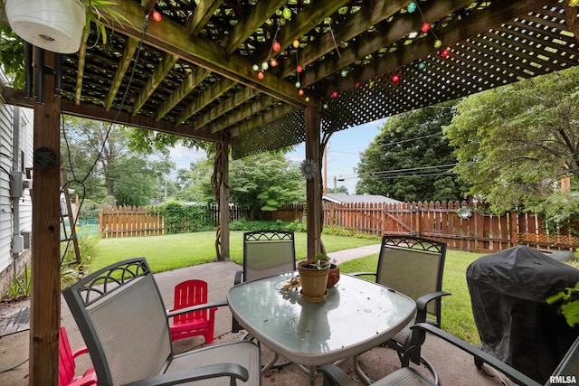 3110 Jefferson Ave, Davenport, IA 52803 - fenced backyard featuring a pergola, area for grilling, a patio area, and outdoor dining area