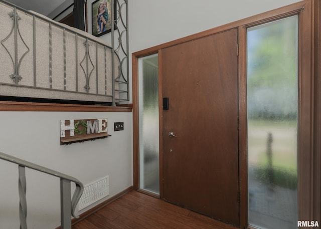 4512 11th Ave Unit C, Moline, IL 61265 - foyer entrance featuring dark wood-style floors and baseboards