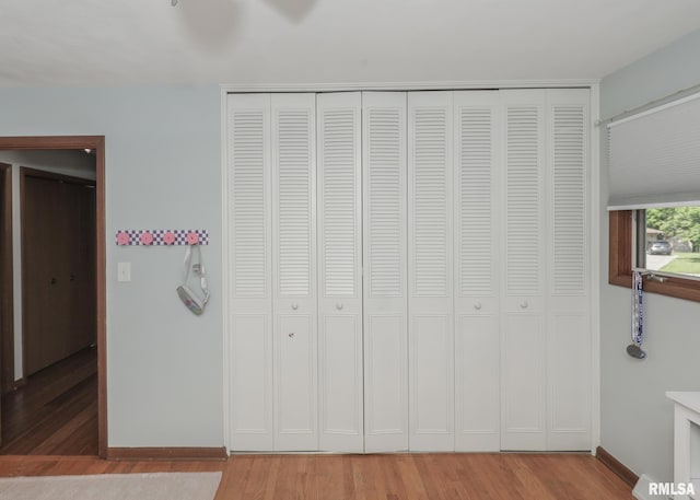 4512 11th Ave Unit C, Moline, IL 61265 - unfurnished bedroom featuring light wood-style floors and a closet