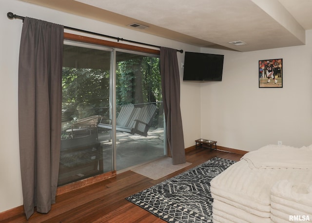 4512 11th Ave Unit C, Moline, IL 61265 - bedroom featuring access to exterior and wood finished floors