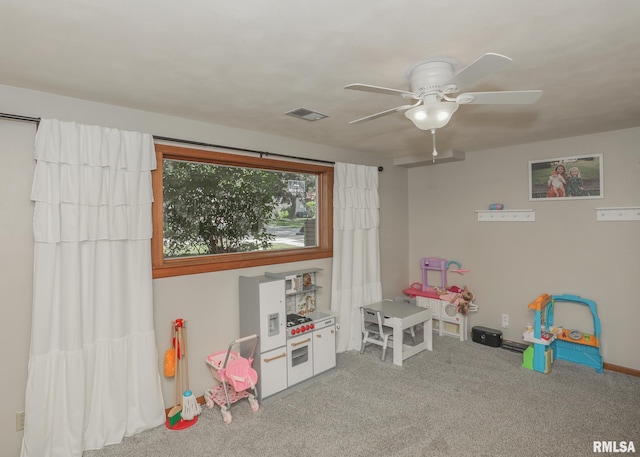 4512 11th Ave Unit C, Moline, IL 61265 - game room featuring carpet and ceiling fan