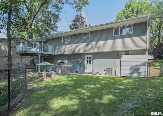 4512 11th Ave Unit C, Moline, IL 61265 - rear view of house with a deck