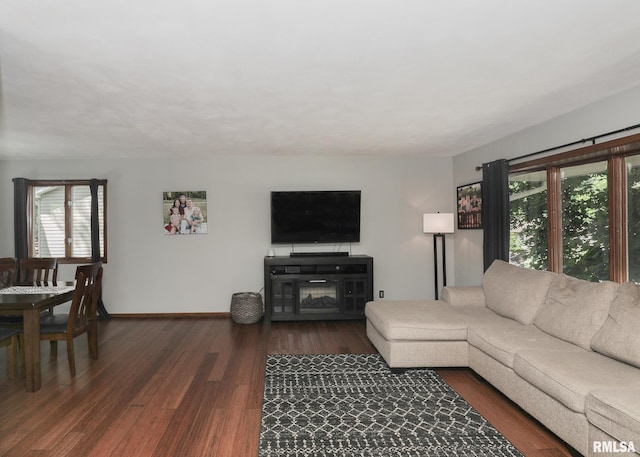 4512 11th Ave Unit C, Moline, IL 61265 - living area featuring wood finished floors and baseboards