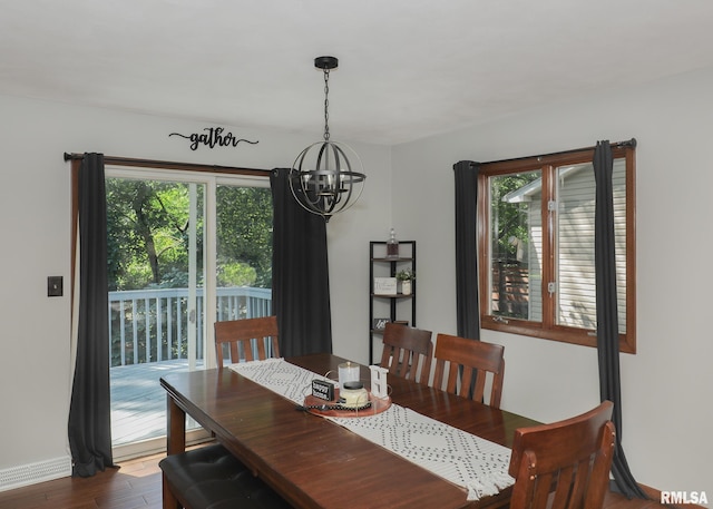 4512 11th Ave Unit C, Moline, IL 61265 - dining room featuring a chandelier and wood finished floors