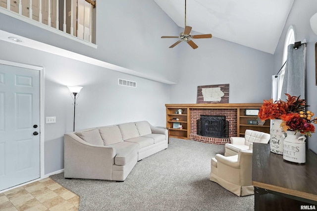 732 W 59th St, Davenport, IA 52806 - living room featuring high vaulted ceiling, ceiling fan, and a fireplace
