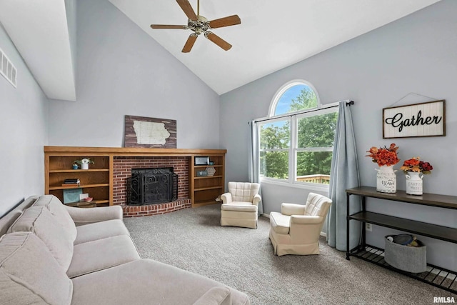 732 W 59th St, Davenport, IA 52806 - living area with high vaulted ceiling, carpet, ceiling fan, and a brick fireplace