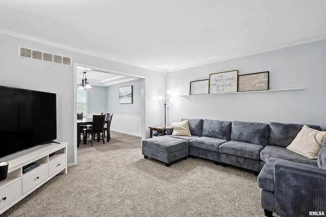 732 W 59th St, Davenport, IA 52806 - living room with crown molding and light carpet