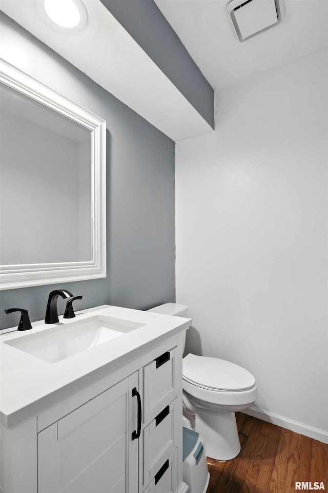 732 W 59th St, Davenport, IA 52806 - half bath with vanity and wood finished floors