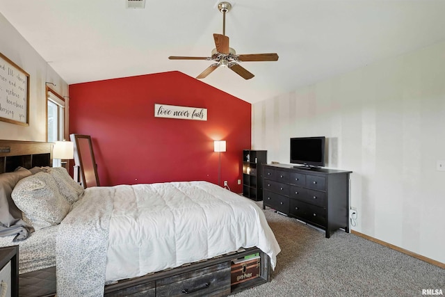 732 W 59th St, Davenport, IA 52806 - bedroom featuring vaulted ceiling, carpet floors, ceiling fan, and an accent wall