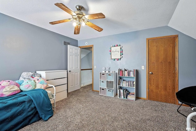 732 W 59th St, Davenport, IA 52806 - carpeted bedroom with a textured ceiling, a ceiling fan, and vaulted ceiling