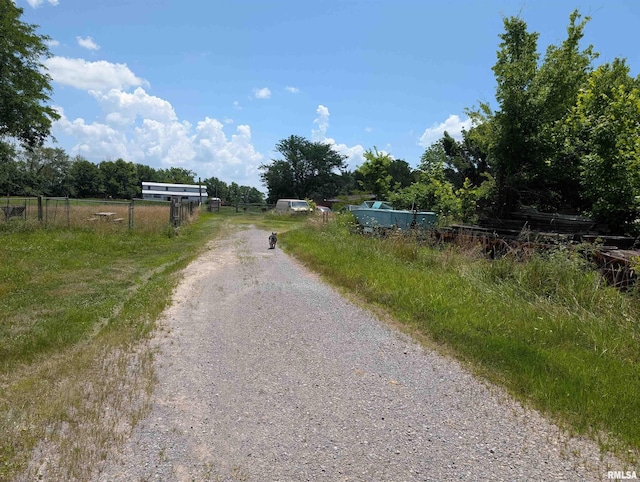 340 Dameron Ln, Vienna, IL 62995 - view of dirt / gravel driveway featuring a rural view