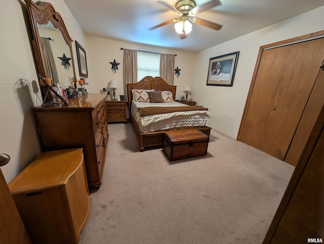 340 Dameron Ln, Vienna, IL 62995 - bedroom with light colored carpet, ceiling fan, and a closet