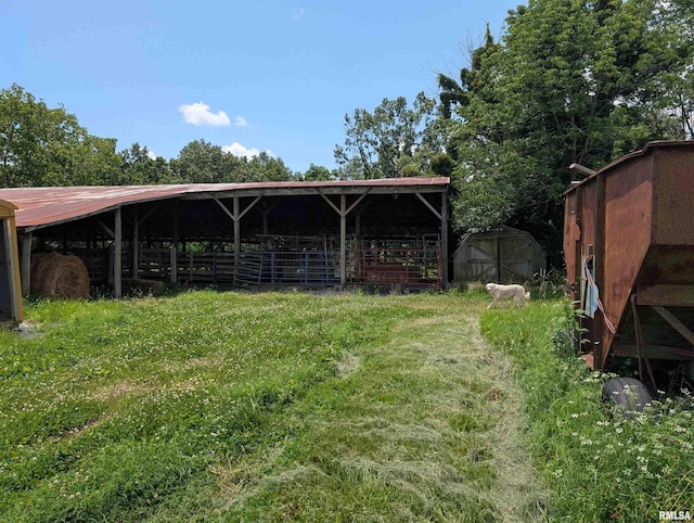 340 Dameron Ln, Vienna, IL 62995 - view of yard with an outdoor structure and an exterior structure