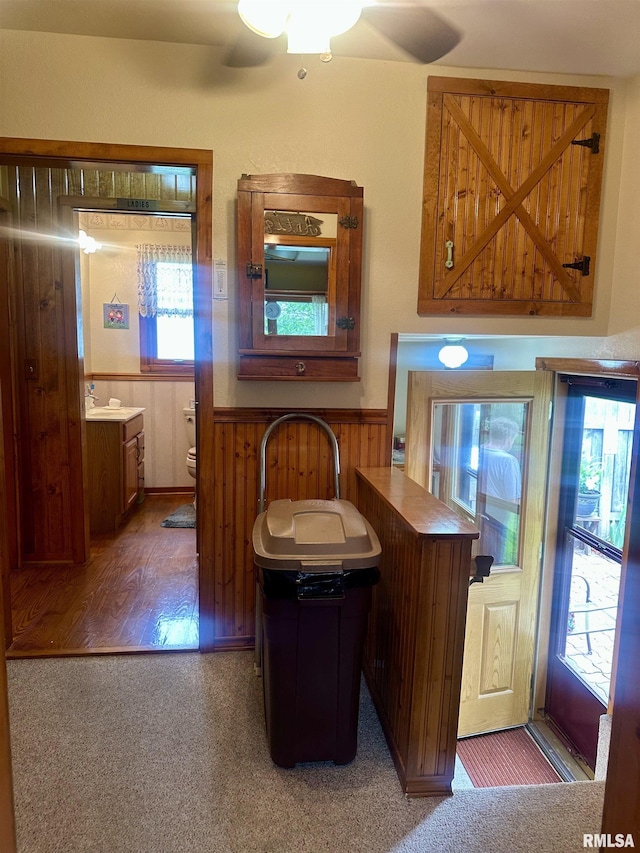 1723 Pershing Blvd, Clinton, IA 52732 - bathroom with a wainscoted wall, ceiling fan, and vanity