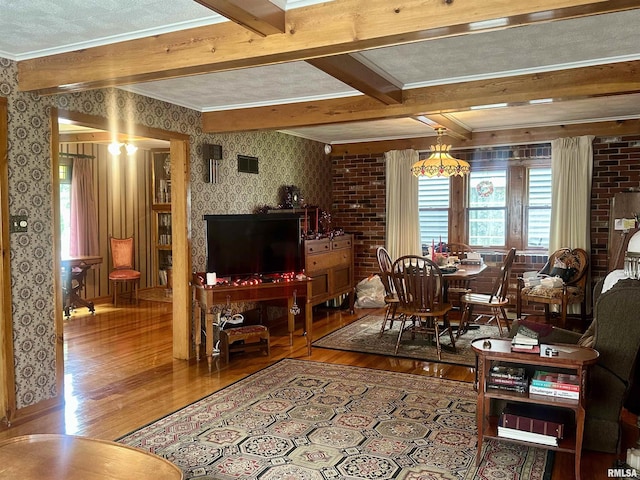 1723 Pershing Blvd, Clinton, IA 52732 - dining space featuring wood finished floors, wallpapered walls, ornamental molding, and beam ceiling