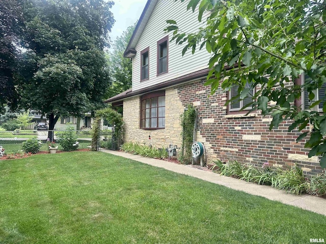 1723 Pershing Blvd, Clinton, IA 52732 - view of property exterior with stone siding