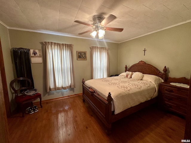 1723 Pershing Blvd, Clinton, IA 52732 - bedroom featuring dark wood-type flooring, ceiling fan, and crown molding