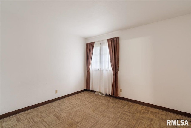 17223 N Cedar Rd, East Moline, IL 61244 - unfurnished room with baseboards
