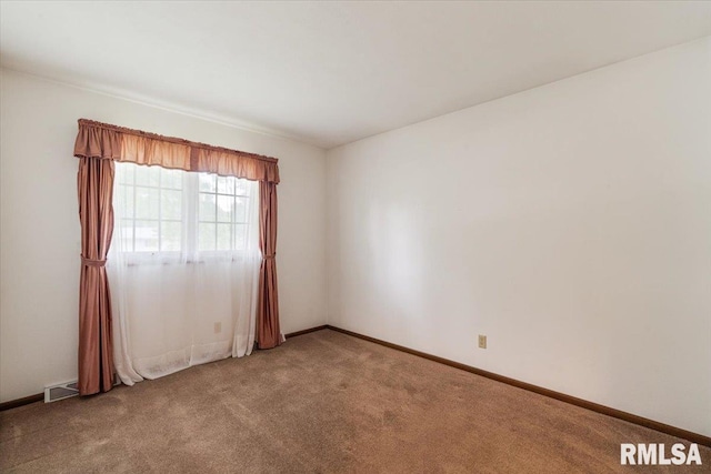 17223 N Cedar Rd, East Moline, IL 61244 - unfurnished room featuring light carpet and baseboards