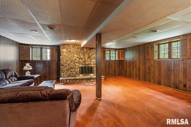 17223 N Cedar Rd, East Moline, IL 61244 - living room with a drop ceiling, a fireplace, carpet floors, and wood walls