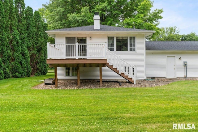 17223 N Cedar Rd, East Moline, IL 61244 - rear view of house with a wooden deck, a chimney, a lawn, and stairs