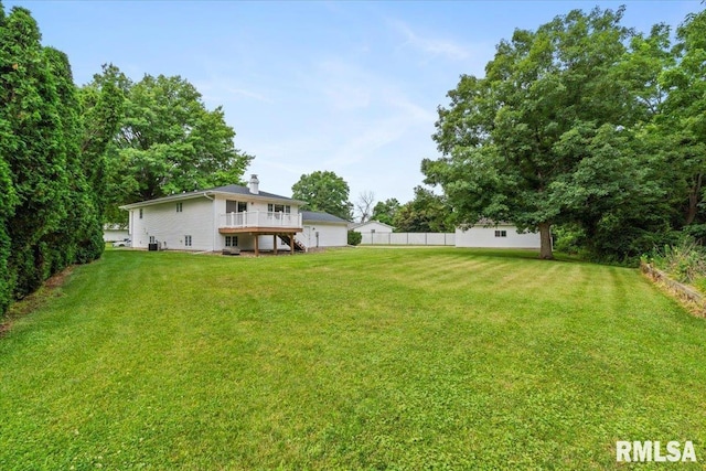 17223 N Cedar Rd, East Moline, IL 61244 - view of yard featuring a deck and stairway