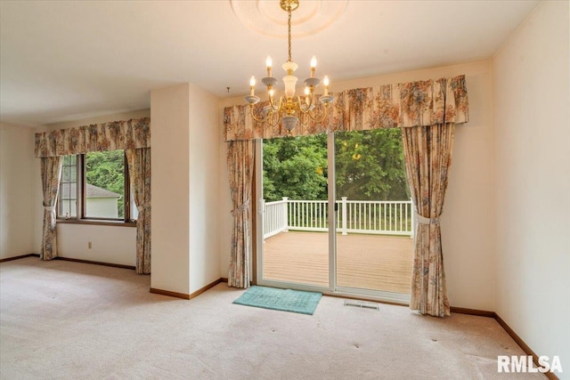 17223 N Cedar Rd, East Moline, IL 61244 - doorway with carpet and a chandelier