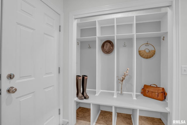 1039 Bluff Ln, Le Claire, IA 52753 - bathroom featuring vanity, a stall shower, and a textured ceiling