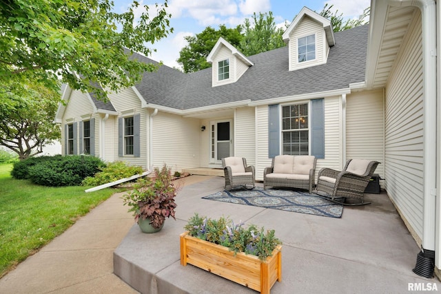 1039 Bluff Ln, Le Claire, IA 52753 - view of patio / terrace with an outdoor living space