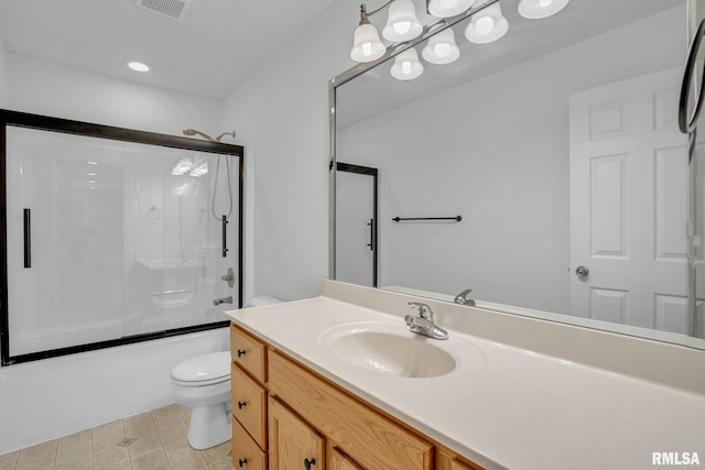 1039 Bluff Ln, Le Claire, IA 52753 - full bath featuring vanity, bath / shower combo with glass door, and tile patterned flooring