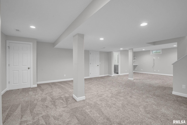1039 Bluff Ln, Le Claire, IA 52753 - finished basement featuring carpet floors and recessed lighting