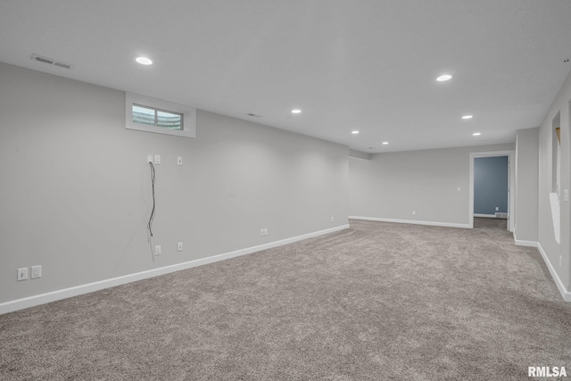 1039 Bluff Ln, Le Claire, IA 52753 - finished below grade area featuring recessed lighting and carpet