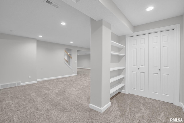 1039 Bluff Ln, Le Claire, IA 52753 - finished below grade area featuring carpet, recessed lighting, and stairs