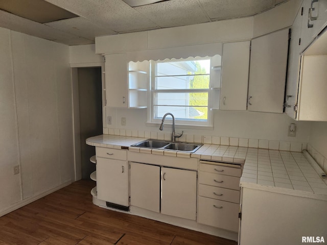 625 W Prospect St, Kewanee, IL 61443 - kitchen with tile counters, white cabinets, dark wood-style floors, open shelves, and a paneled ceiling