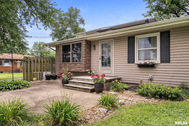 13118 65th Ave, Blue Grass, IA 52726 - view of front of home with a patio