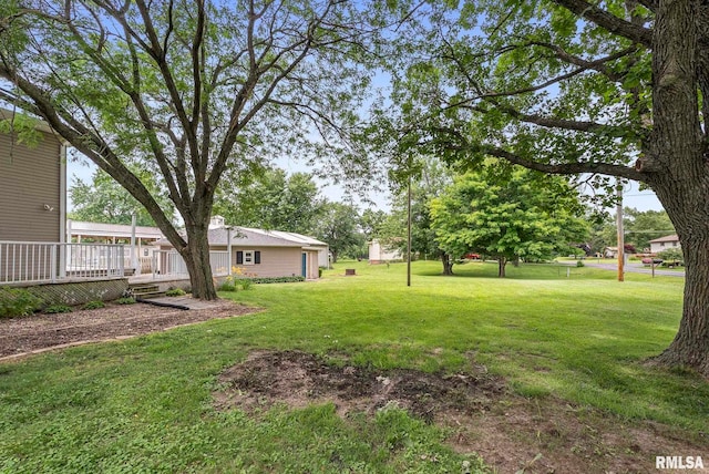13118 65th Ave, Blue Grass, IA 52726 - view of grassy yard featuring a wooden deck