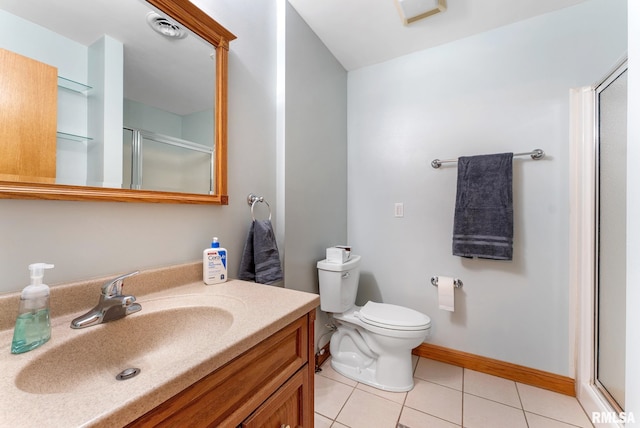 13118 65th Ave, Blue Grass, IA 52726 - full bath featuring a shower stall, tile patterned floors, and vanity