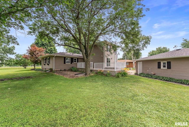 13118 65th Ave, Blue Grass, IA 52726 - view of green lawn featuring a wooden deck