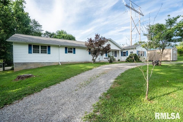 17000 Log Cabin Rd, Marion, IL 62959 - single story home featuring gravel driveway and a front yard