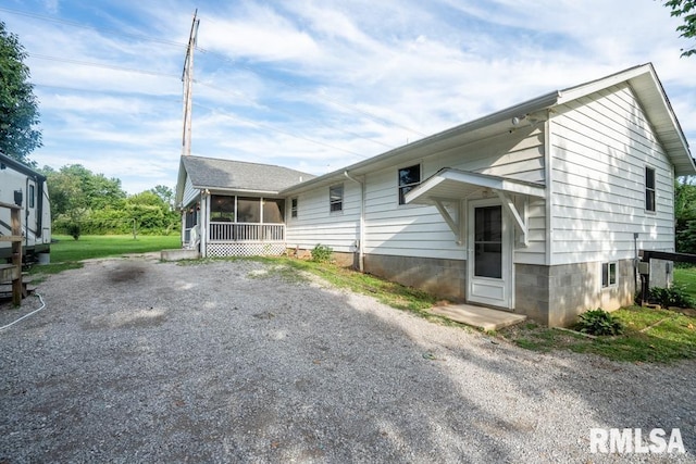 17000 Log Cabin Rd, Marion, IL 62959 - rear view of house featuring a sunroom and driveway