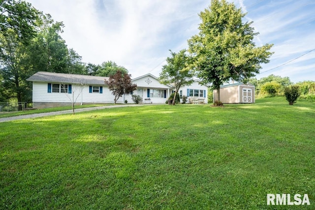 17000 Log Cabin Rd, Marion, IL 62959 - single story home with a storage shed and a front yard