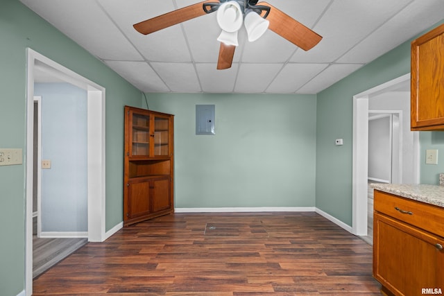 1671 US Highway 67, Preemption, IL 61276 - empty room featuring electric panel, a paneled ceiling, dark wood finished floors, and ceiling fan