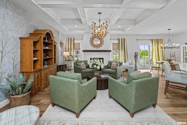 5835 Pigeon Creek Rd, Bettendorf, IA 52722 - living room with a chandelier, wood finished floors, beamed ceiling, coffered ceiling, and a fireplace
