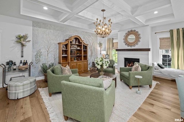 5835 Pigeon Creek Rd, Bettendorf, IA 52722 - living area with coffered ceiling, healthy amount of natural light, wood finished floors, beam ceiling, and a chandelier