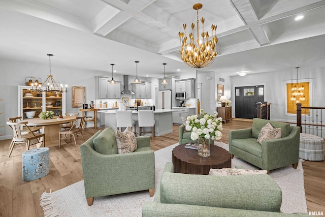 5835 Pigeon Creek Rd, Bettendorf, IA 52722 - living area featuring a chandelier, coffered ceiling, light wood-type flooring, recessed lighting, and beam ceiling