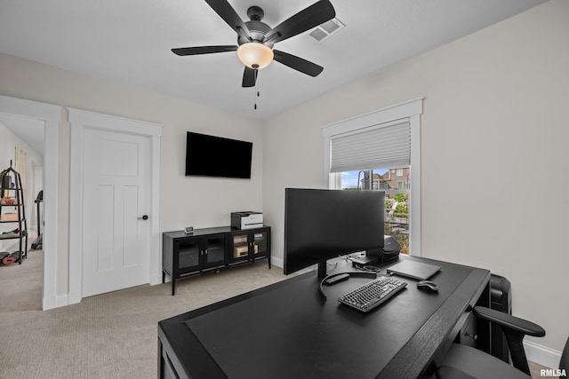 5835 Pigeon Creek Rd, Bettendorf, IA 52722 - office area with a ceiling fan and light carpet