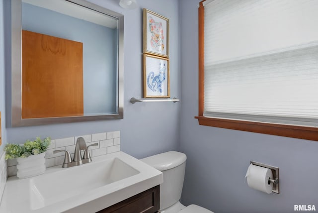 505 N 7th St, Eldridge, IA 52748 - half bathroom with vanity and tasteful backsplash