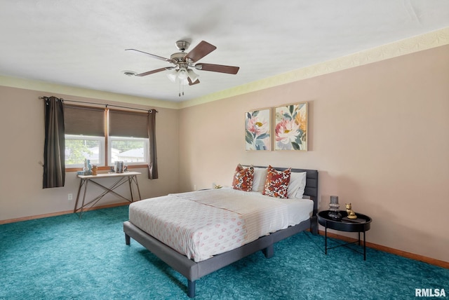 505 N 7th St, Eldridge, IA 52748 - bedroom featuring ceiling fan and carpet