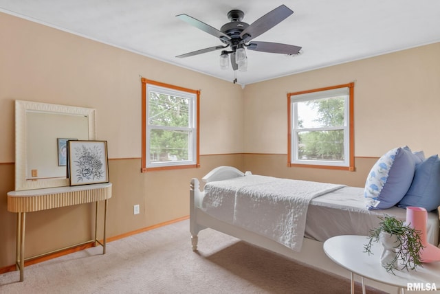 505 N 7th St, Eldridge, IA 52748 - carpeted bedroom with crown molding and ceiling fan