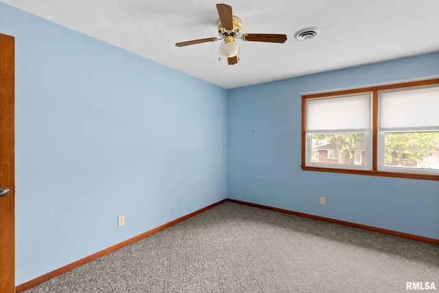 505 N 7th St, Eldridge, IA 52748 - unfurnished room featuring carpet floors and ceiling fan